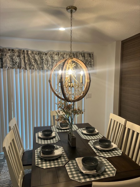 A dining-room chandelier installed by JEOAH Electric in a Lehigh Valley home